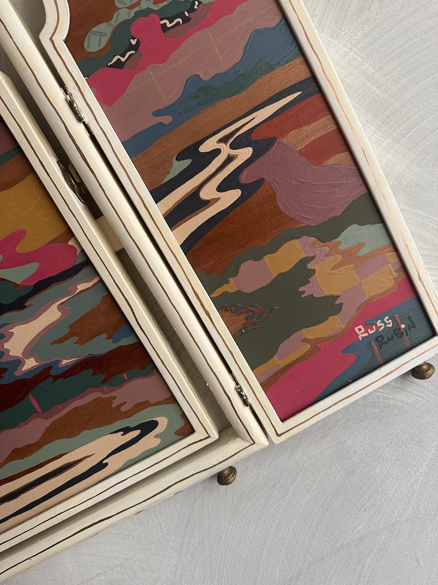 Abstract landscape painting on wood in vintage triptych frame by Russ Rubin - angle detail view on wall