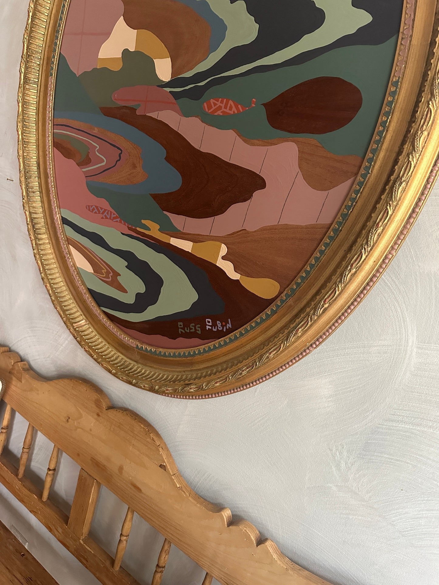 Abstract landscape painting on wood in vintage frame by Russ Rubin - angle detail view on wall