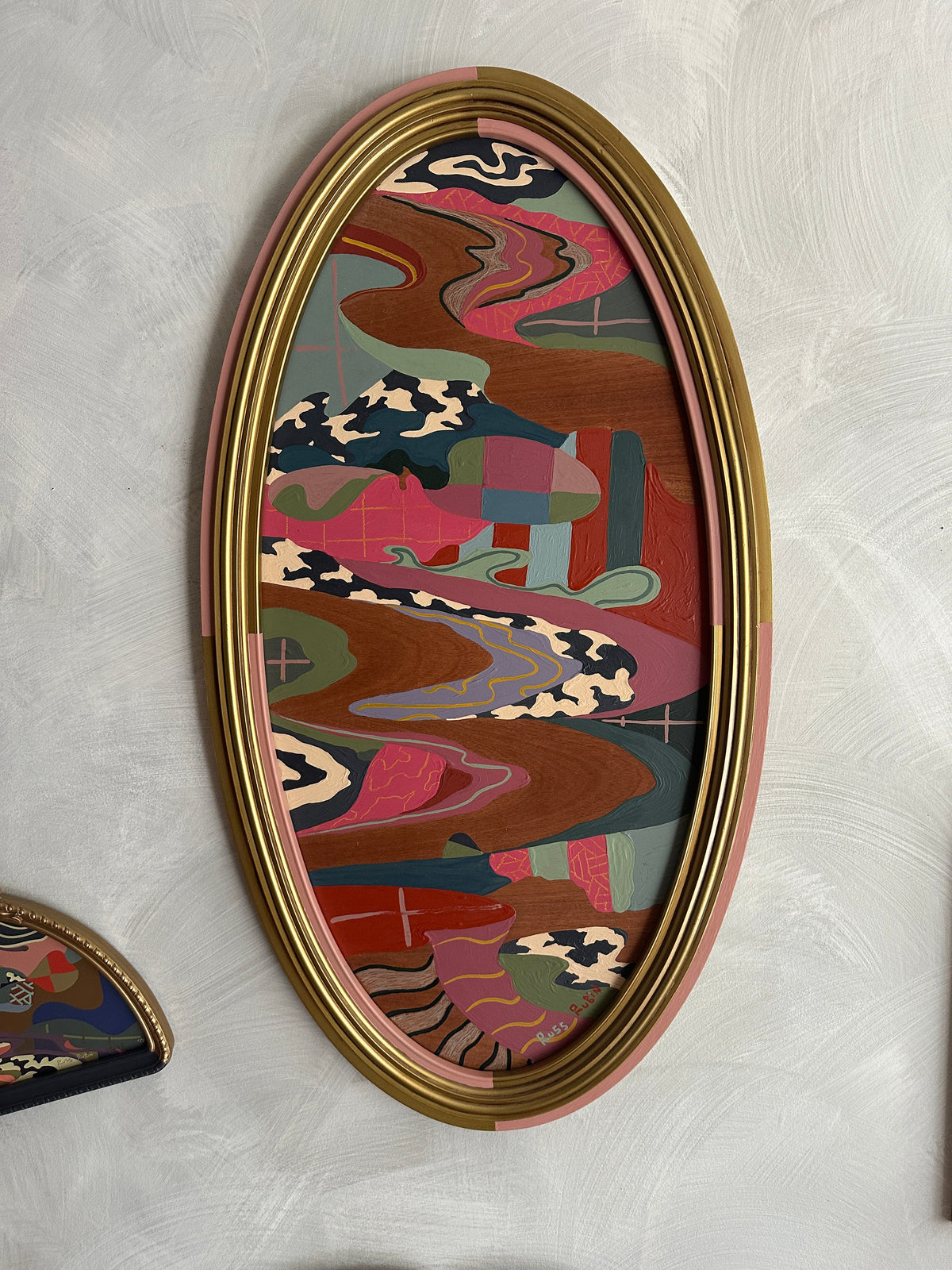 Abstract landscape painting on wood in vintage frame by Russ Rubin - front view on wall