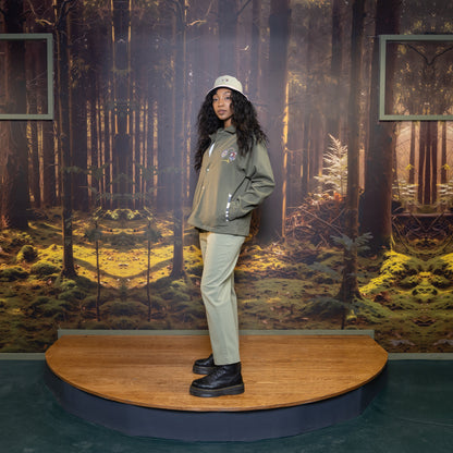 Be Out Bucket Hat front view on pink and green side on model