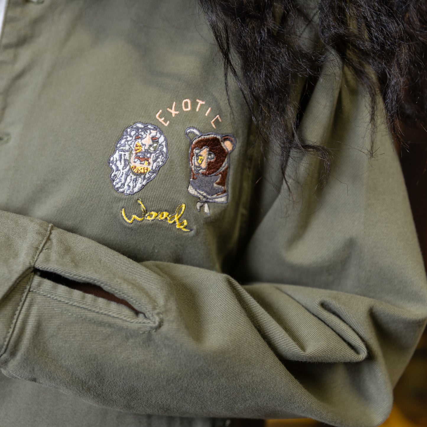 Bear+Lion Explorer Jacket front embroidery detail on model