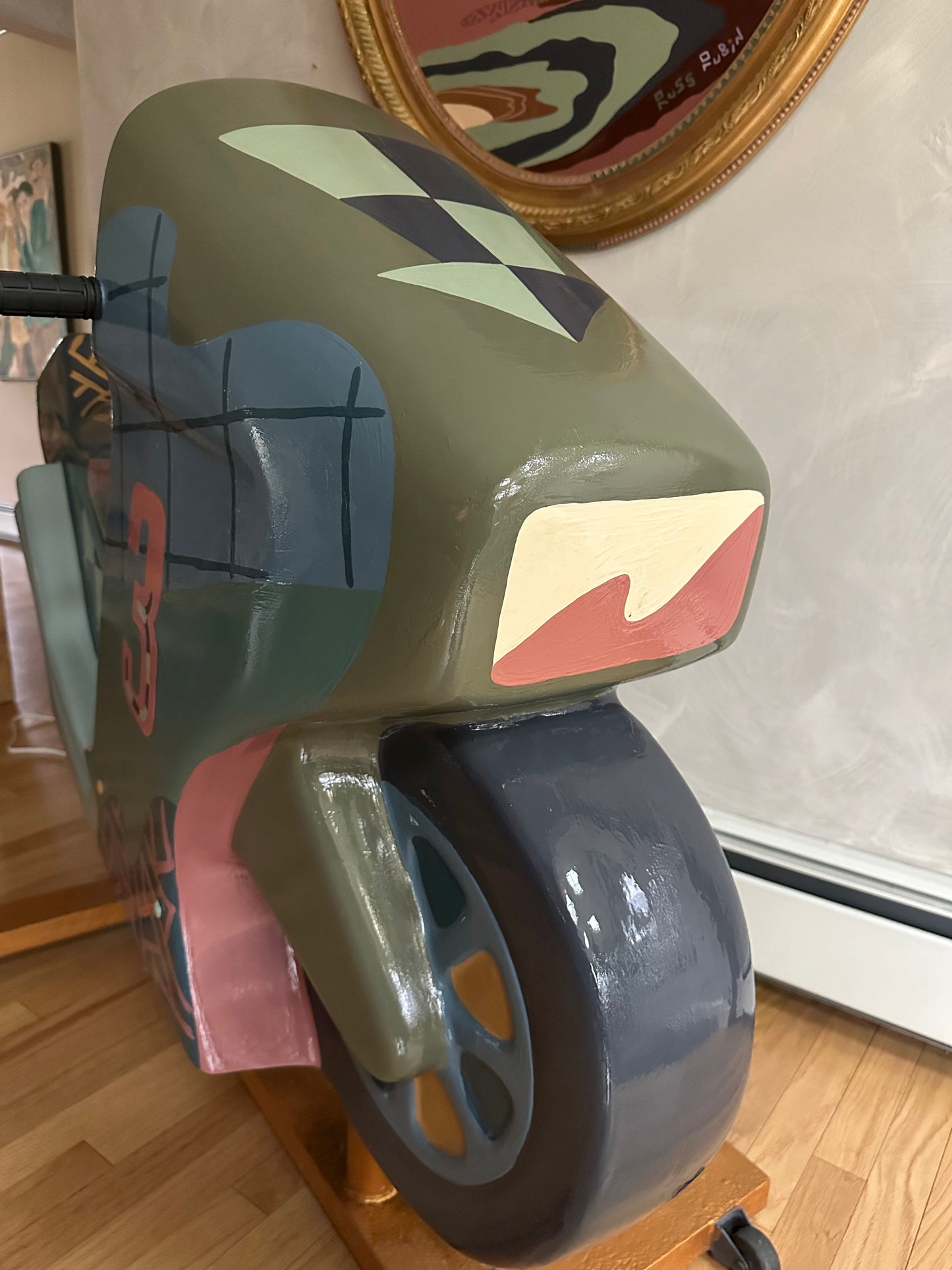 Hand painted motorcycle kiddie ride by Russ Rubin - front angle view