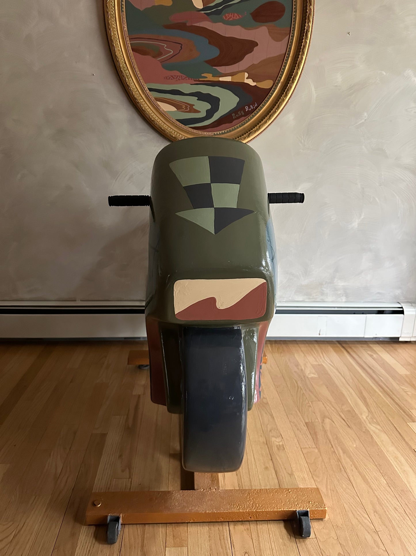 Hand painted motorcycle kiddie ride by Russ Rubin - front view