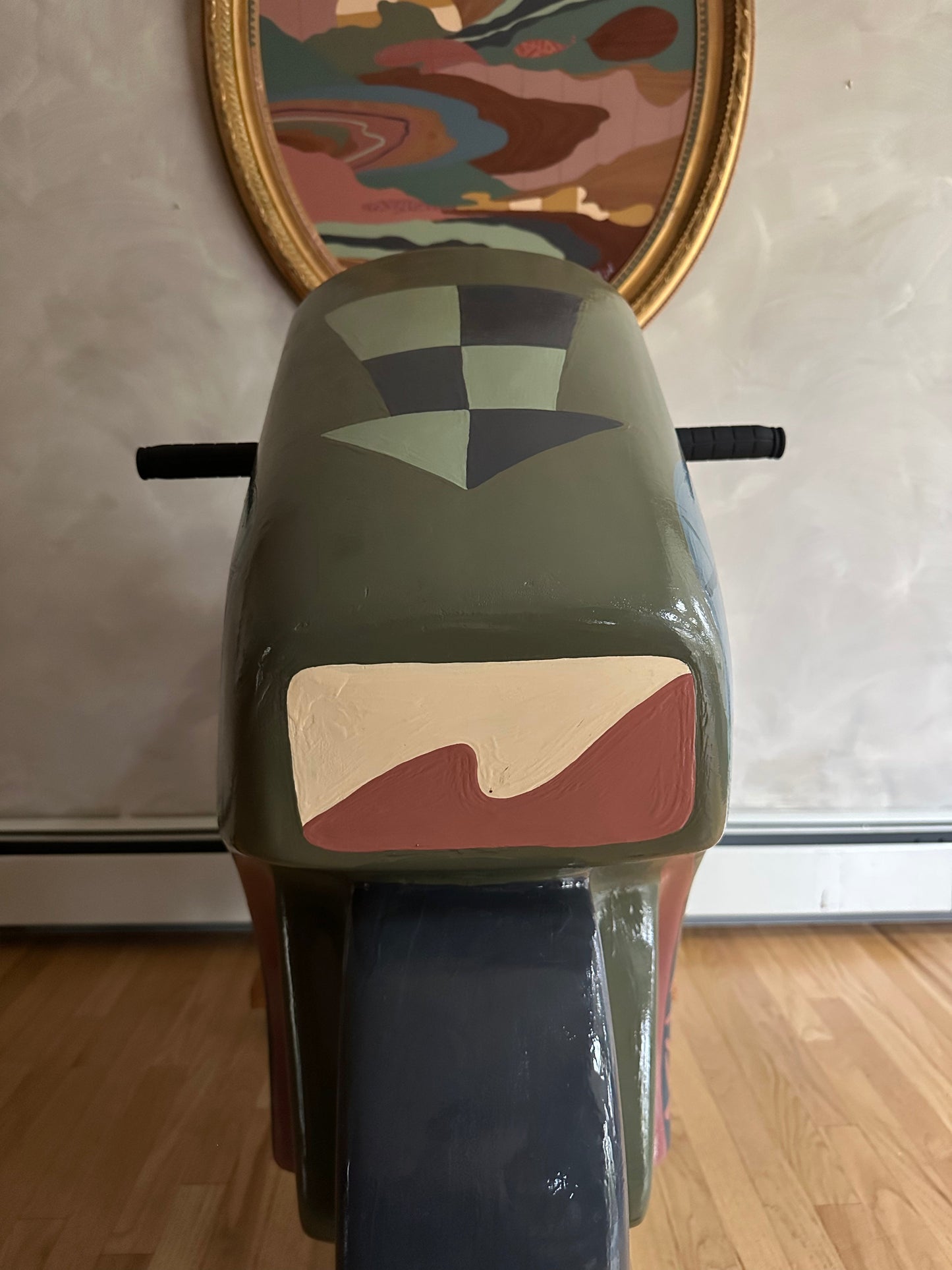 Hand painted motorcycle kiddie ride by Russ Rubin - front view