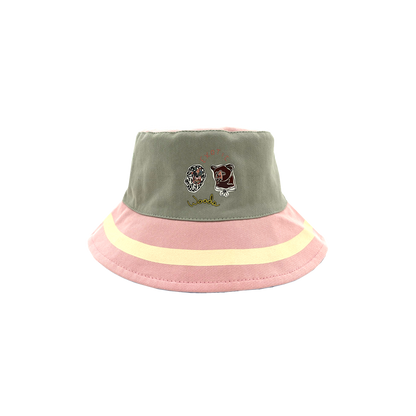 Be Out Bucket Hat front view on pink and green side