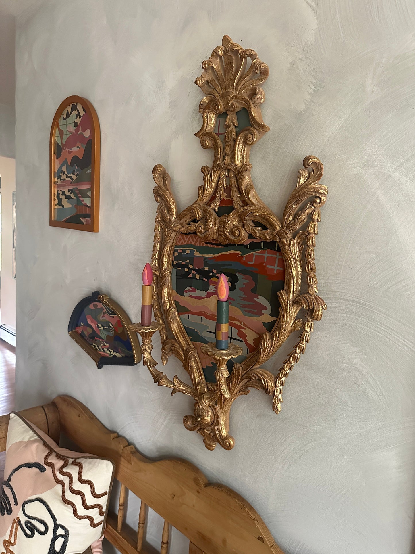 Abstract landscape painting on wood in vintage candelabra frame by Russ Rubin - angle view on wall with other art