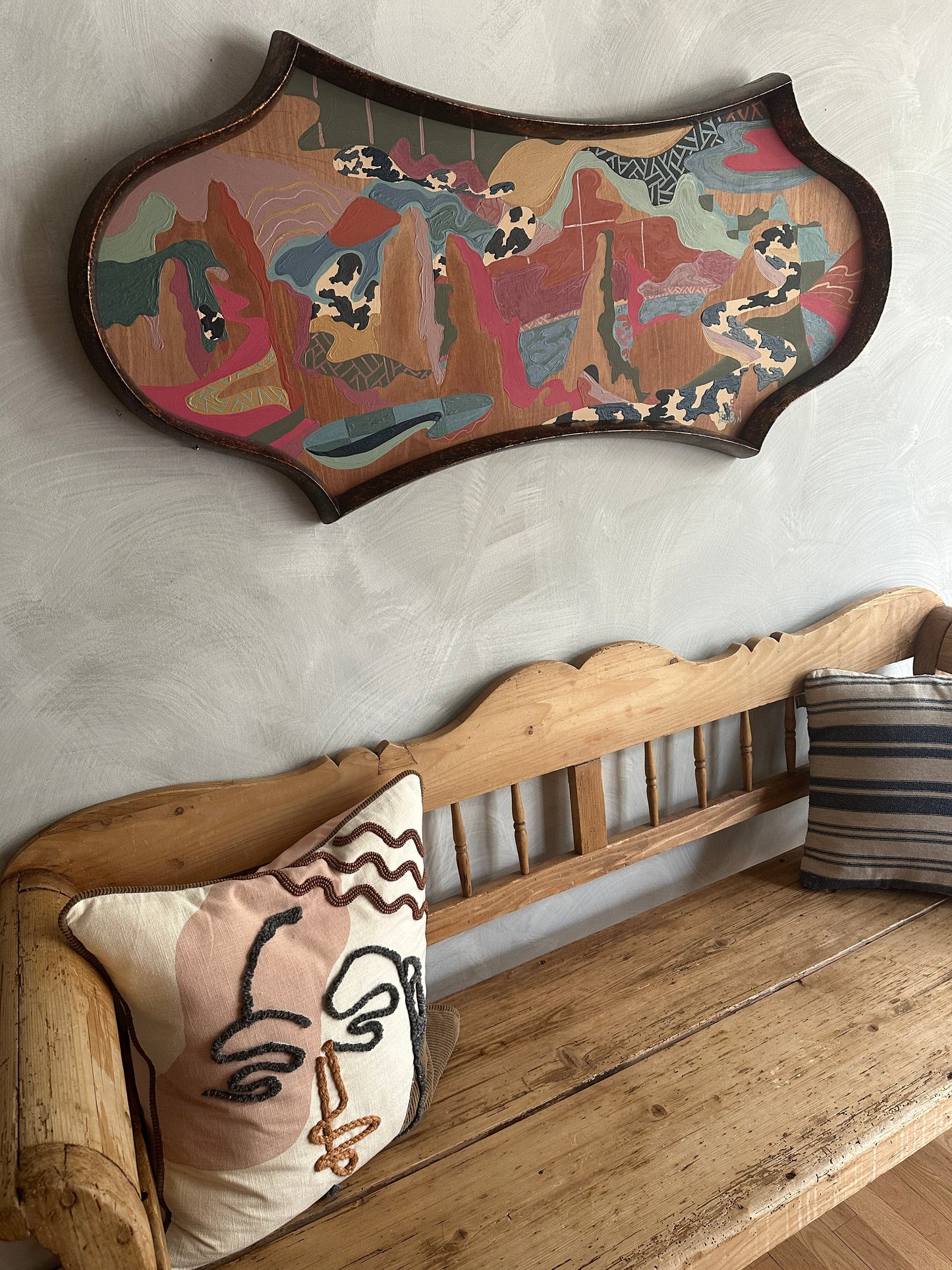 Abstract landscape painting on wood in vintage frame by Russ Rubin - angle view on wall 