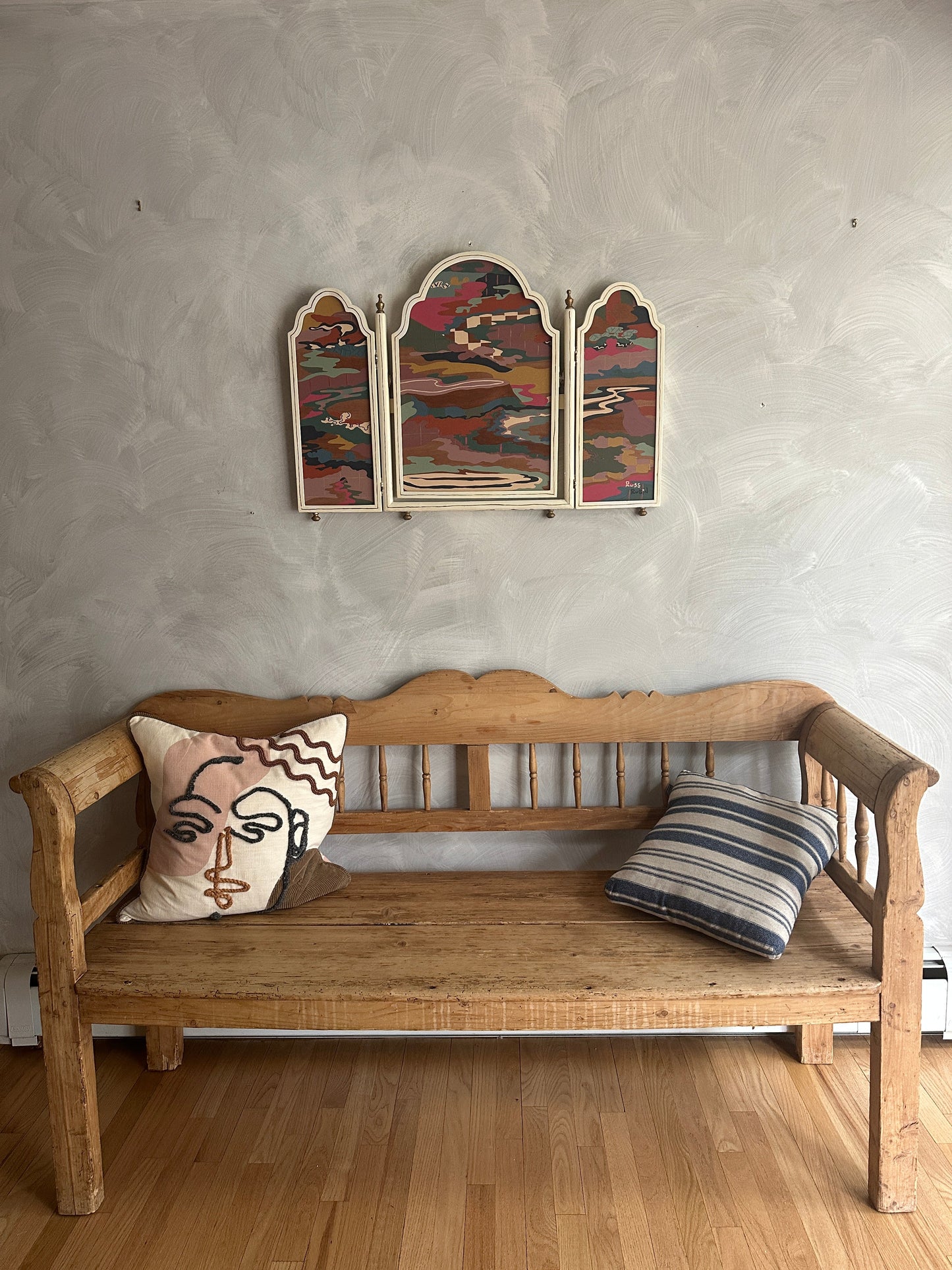 Abstract landscape painting on wood in vintage triptych frame by Russ Rubin - front view on wall 