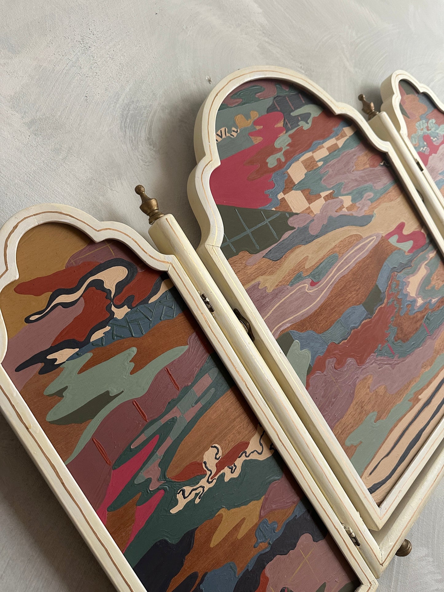 Abstract landscape painting on wood in vintage triptych frame by Russ Rubin - angle detail view on wall 