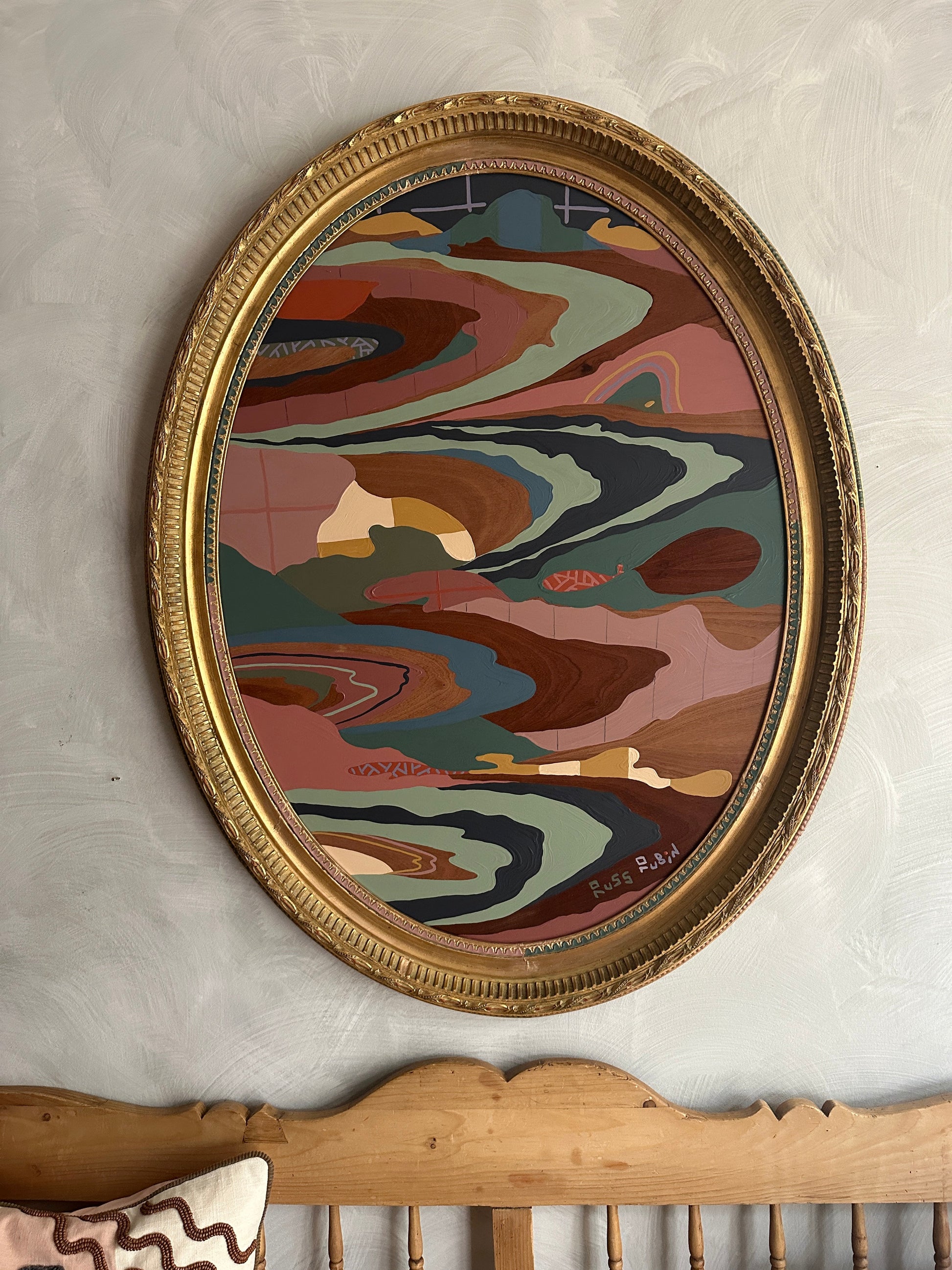 Abstract landscape painting on wood in vintage frame by Russ Rubin - front view on wall