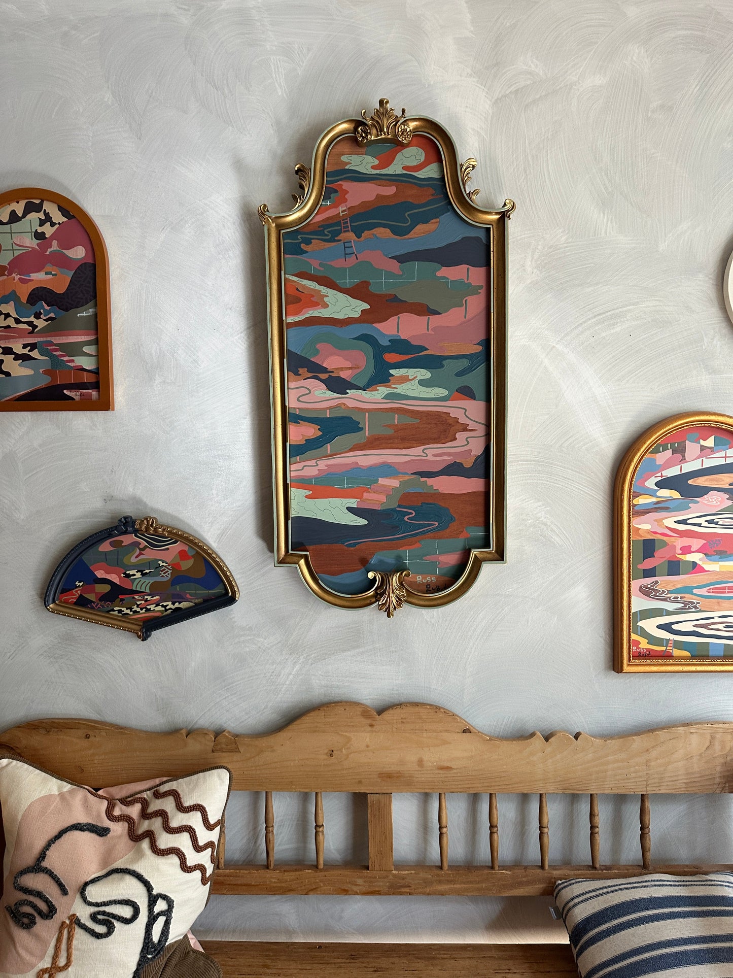 Abstract landscape on wood in vintage frame by Russ Rubin - front view on wall with other art