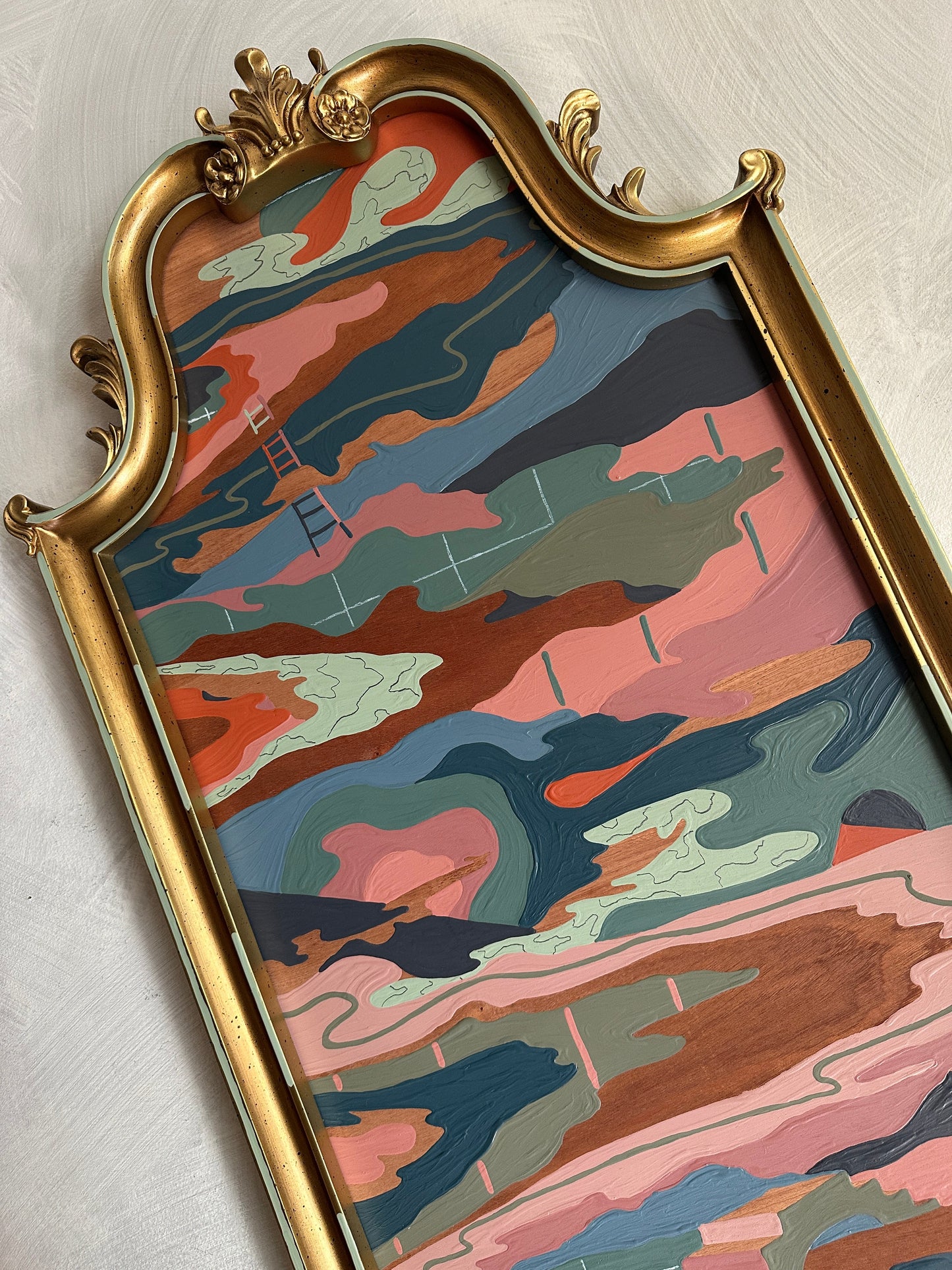 Abstract landscape on wood in vintage frame by Russ Rubin - angle view on wall