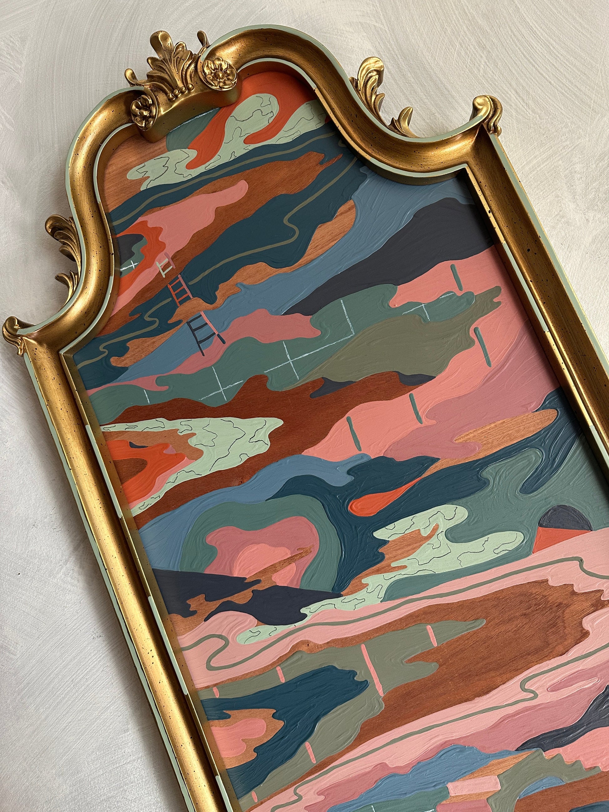 Abstract landscape on wood in vintage frame by Russ Rubin - angle view on wall