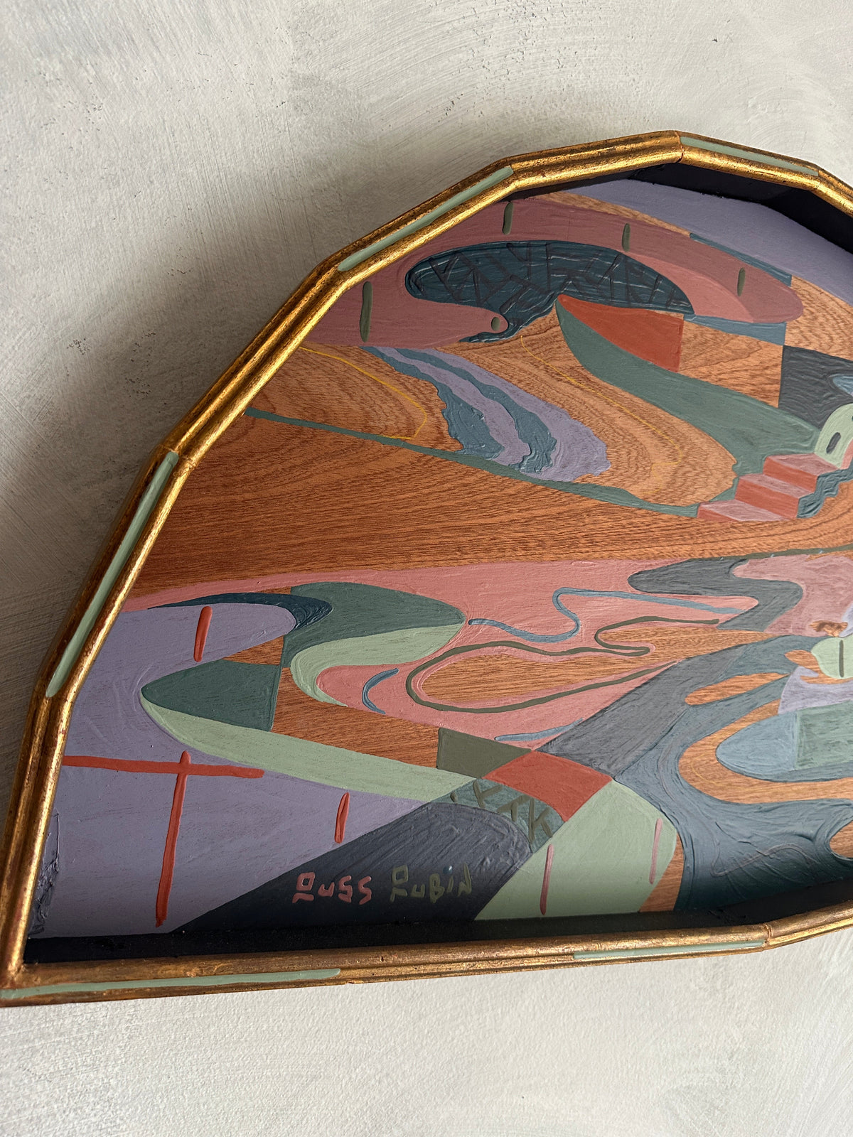 Abstract landscape painting on wood in fan shaped frame by Russ Rubin - detail view on wall
