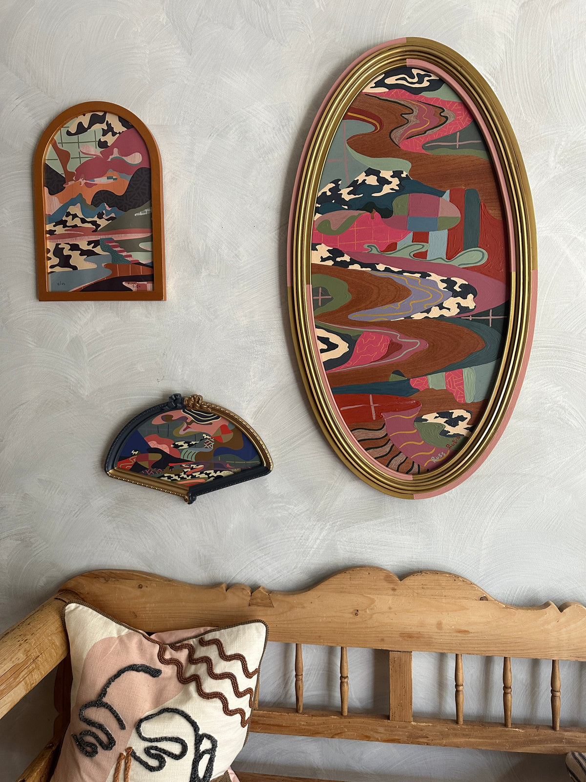 Abstract landscape painting on wood in vintage frame by Russ Rubin - front view on wall with other art