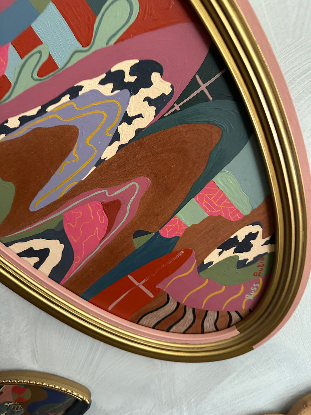 Abstract landscape painting on wood in vintage frame by Russ Rubin - angle detail view on wall